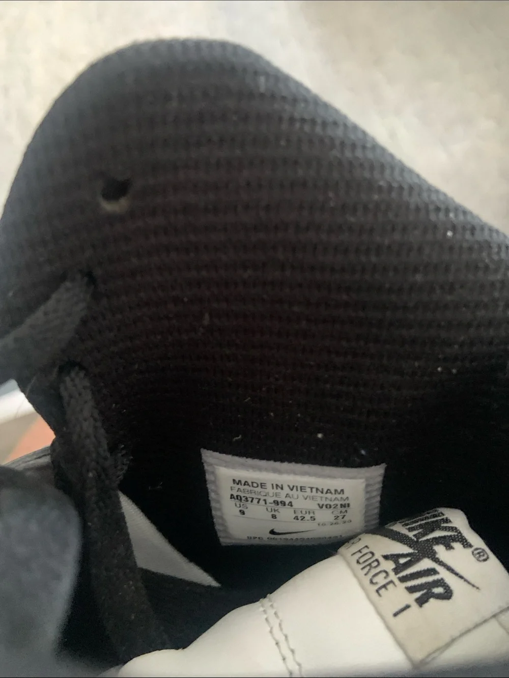 Nike High-Top Sneakers in White and Gray with Black Accents